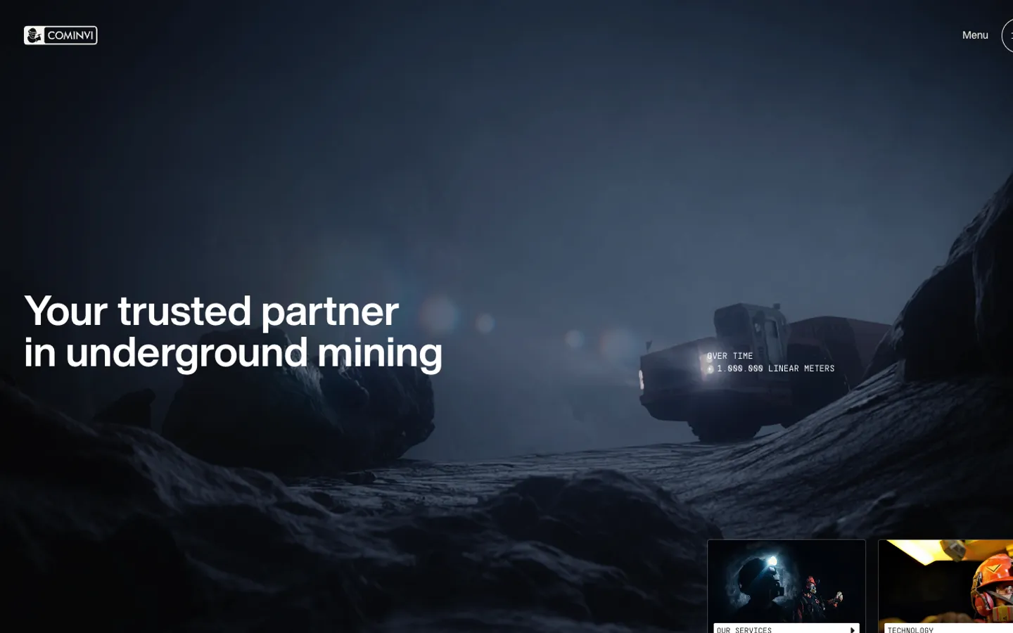 CoMinVi home page: a mining vehicle lit in a dark cave, Your trusted partner in underground mining